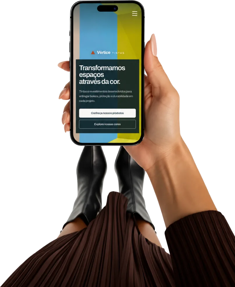 Site institucional da Vértice Tintas na mão, em um iPhone
